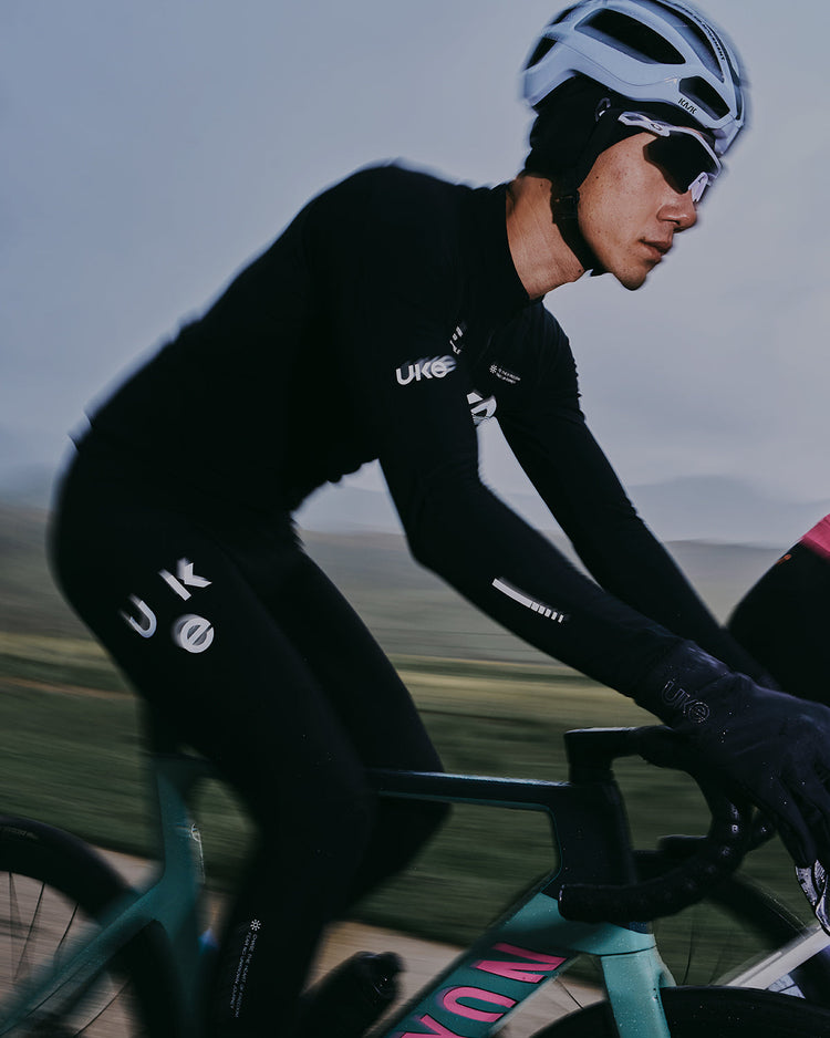 Cyclist riding in mild fall weather